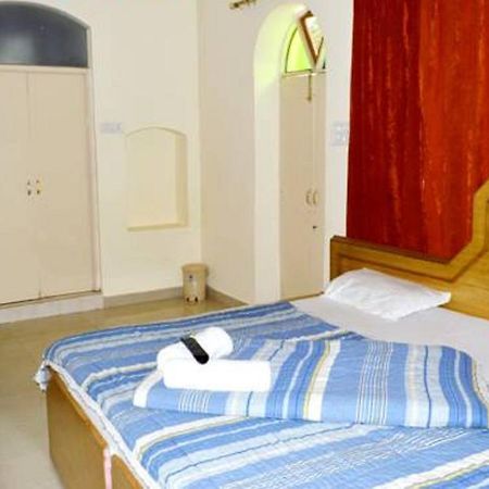 הרידוואר Hotel Bhajgovindam חדר תמונה