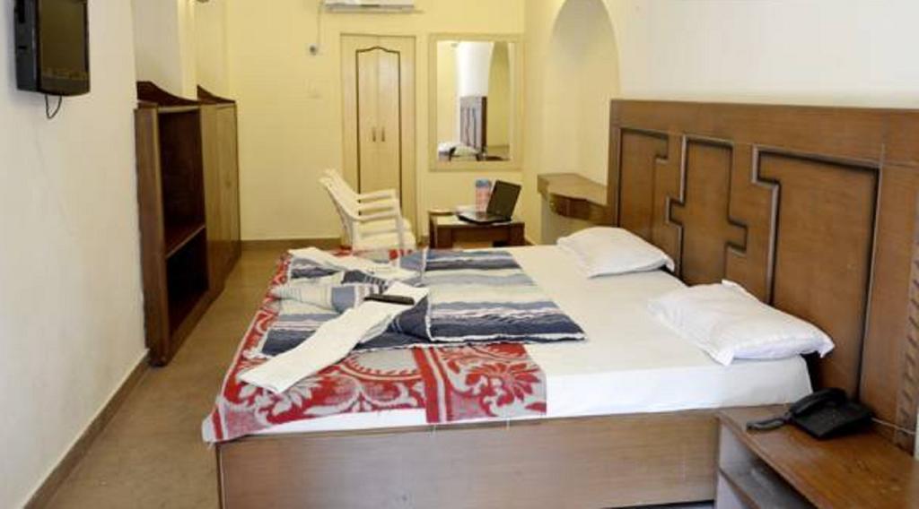 הרידוואר Hotel Bhajgovindam חדר תמונה