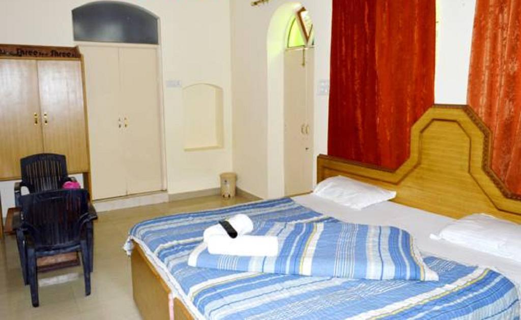 הרידוואר Hotel Bhajgovindam חדר תמונה