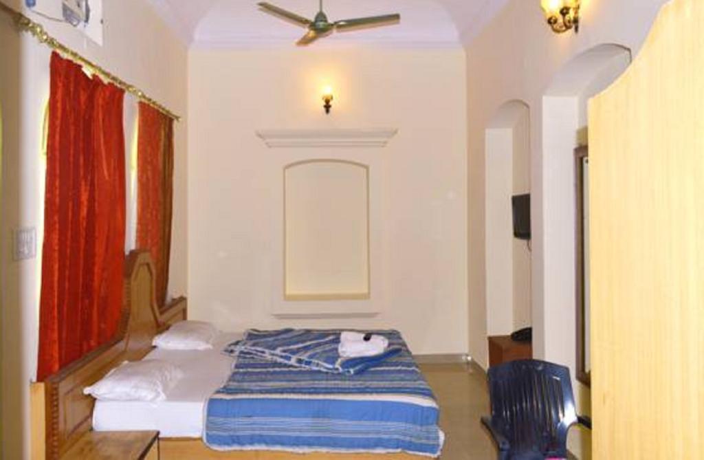 הרידוואר Hotel Bhajgovindam חדר תמונה
