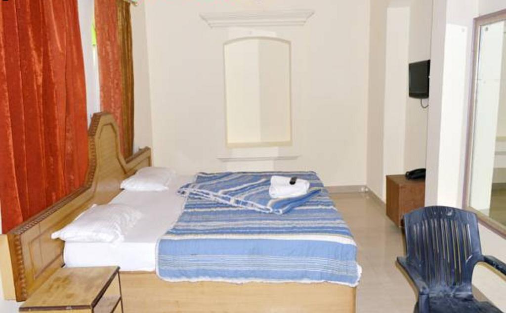 הרידוואר Hotel Bhajgovindam חדר תמונה