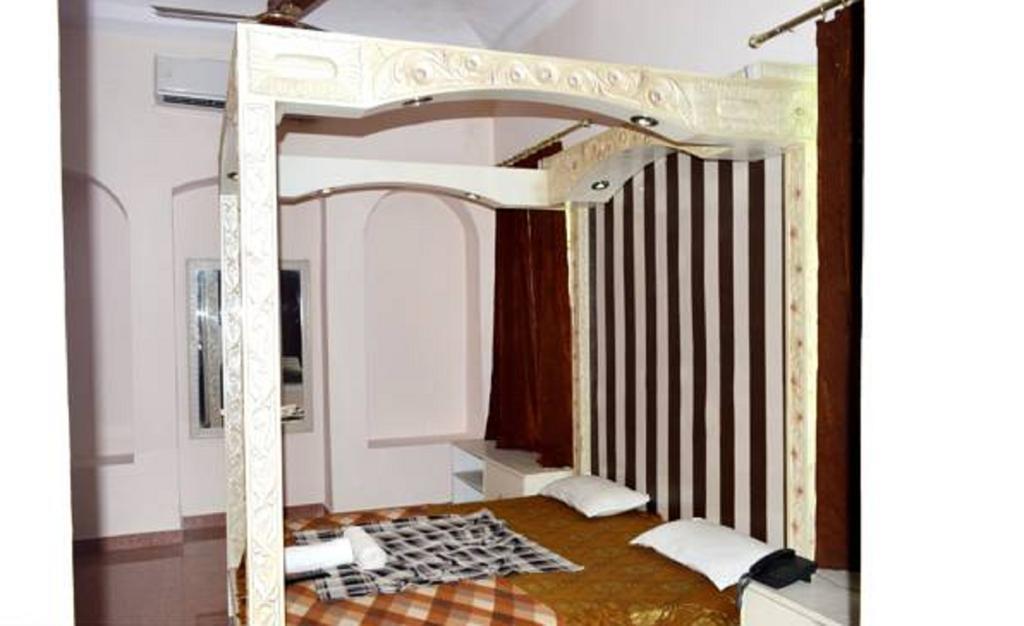 הרידוואר Hotel Bhajgovindam חדר תמונה